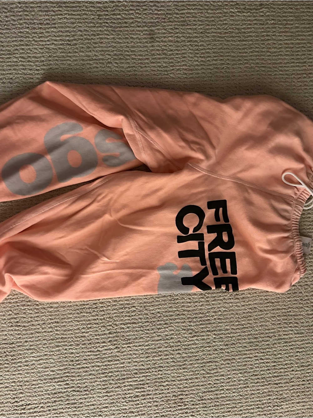 freecity Peach-Orange Kids Sweatpants with Bold Black Logo